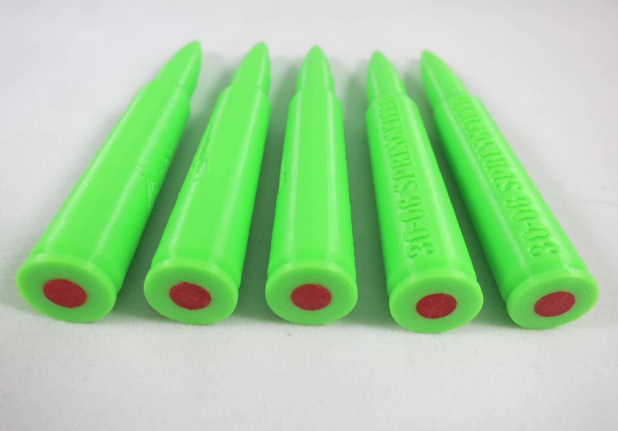 Plastic 30-06 Springfield snap cap green-11