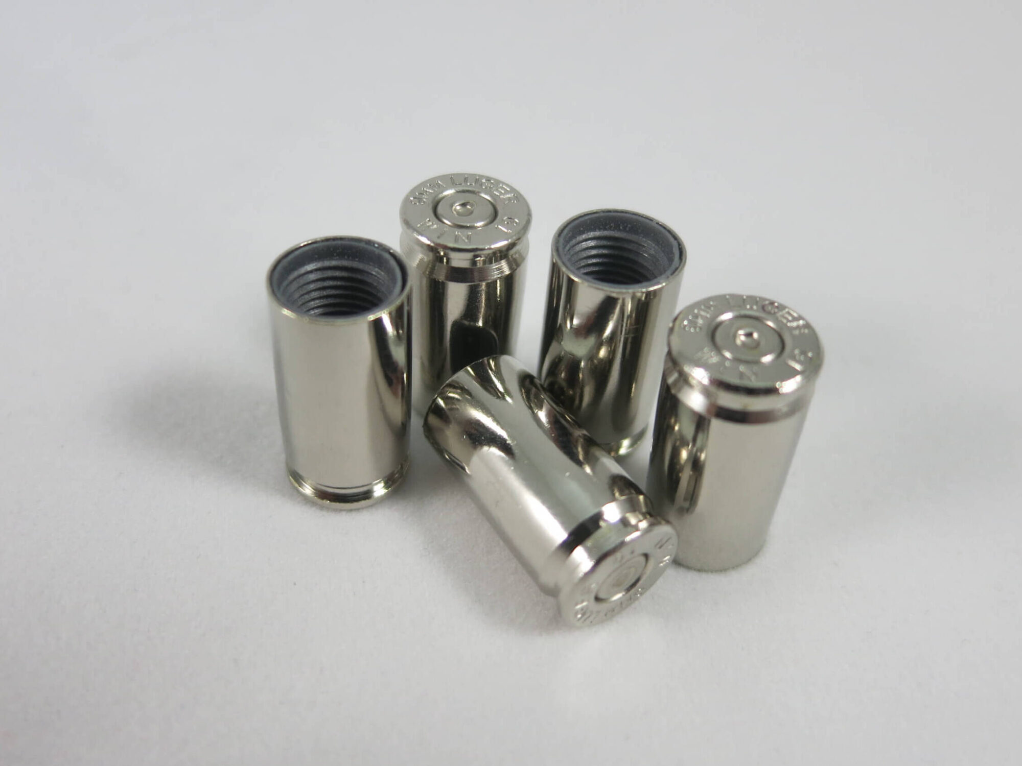 9mm Luger nickel case tire valve cap-1